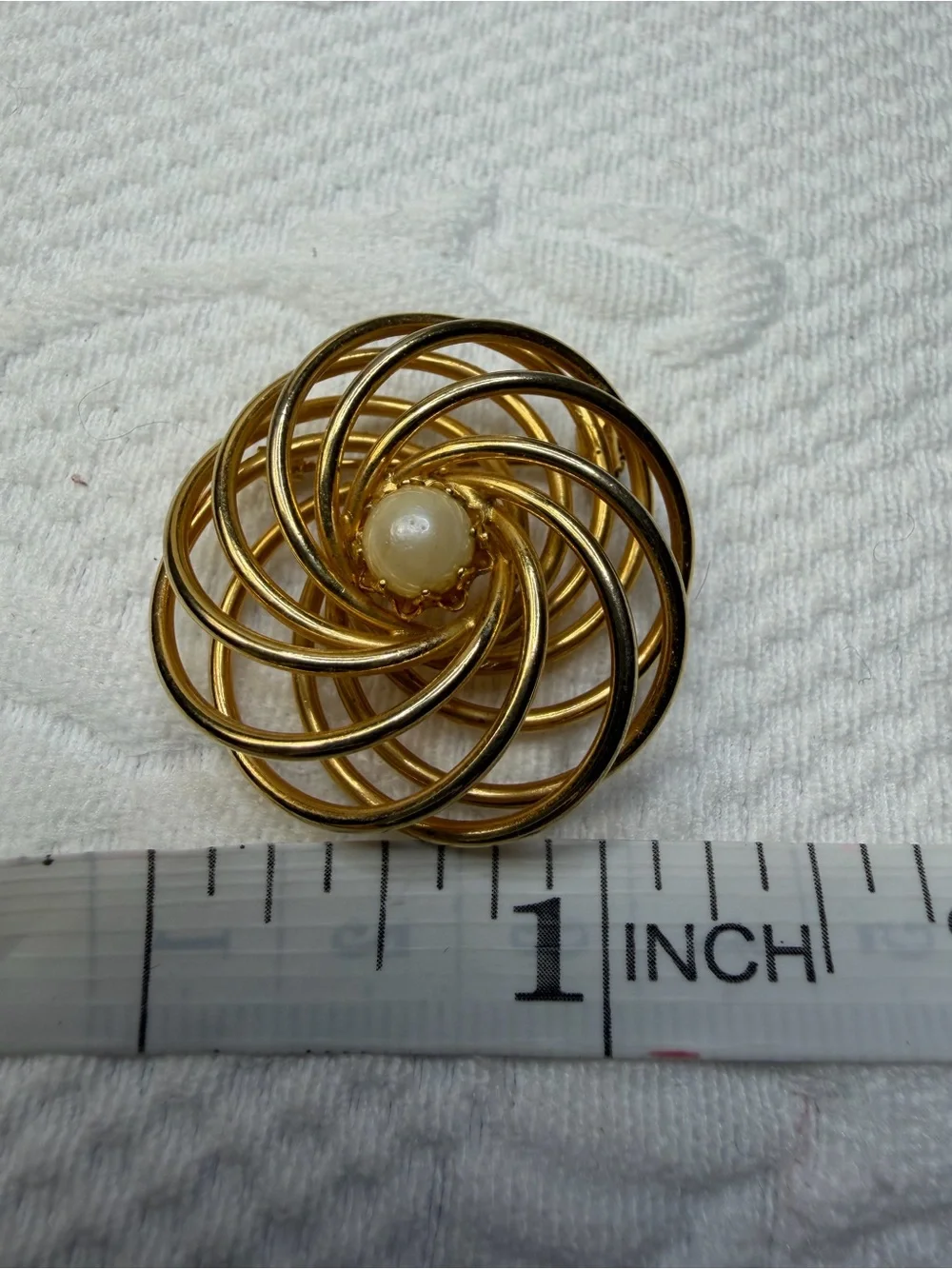 Vintage Gold-Tone Spiral Brooch with Pearl Accent
